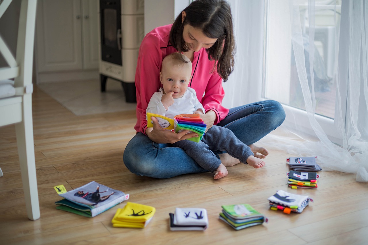 stay at home mom with baby reading books