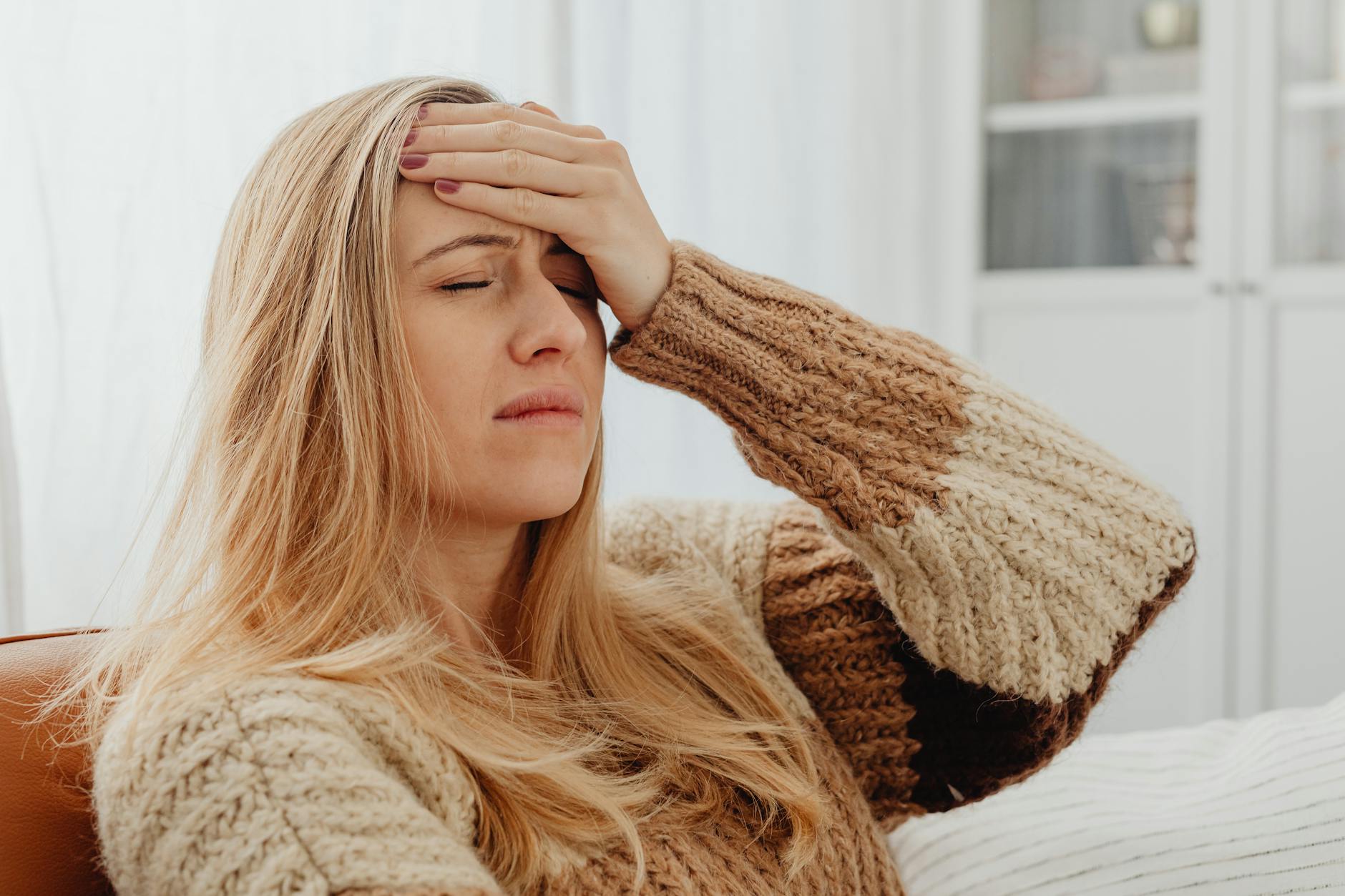 woman suffering from headache